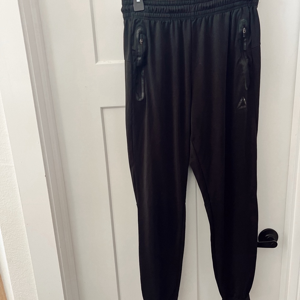 Reebok Black Joggers with Tapered Fit and Athletic Material